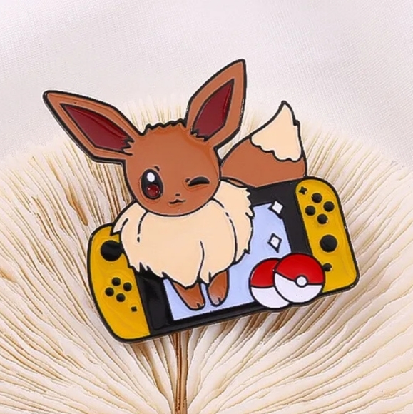 Nintendo Jewelry - 🕹️ Eevee Nintendo Switch Pin